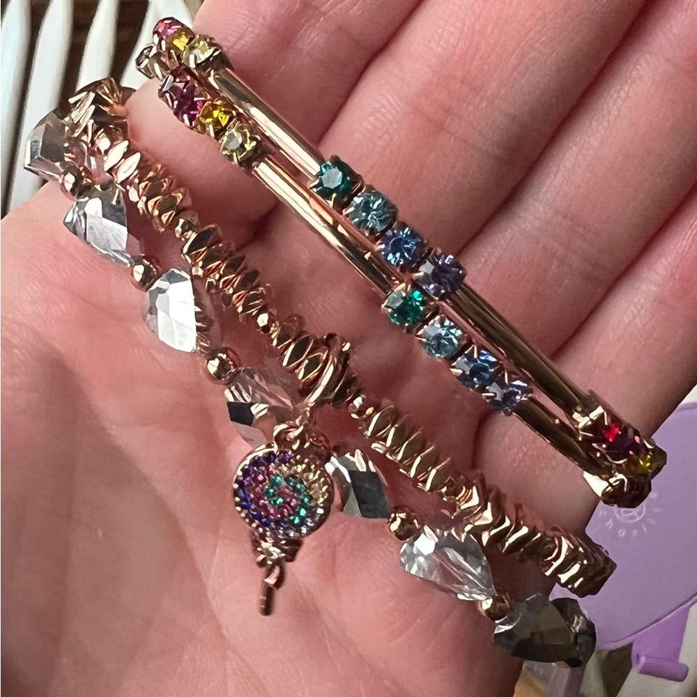 Set of 3. Charm is removable. Rose hold. SRP $132